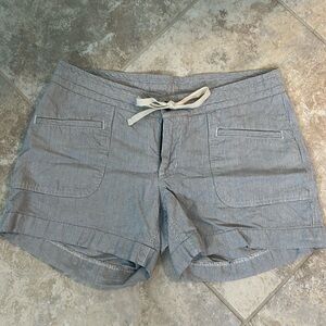 The North Face chambray striped short with button and tie fasten.